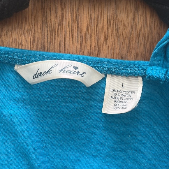 Derek Heart
Size L. Gently used 
Color 
Blue and Black
#291A - Picture 4 of 6